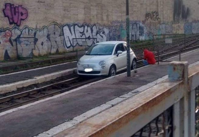 Car stuck on train tracks at Rome's Termini station